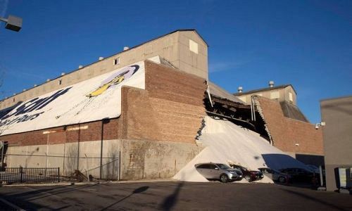 Cars at Acura dealership covered in salt after wall collapses